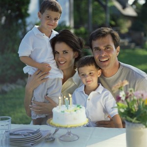 Family at Table with Birthday Cake